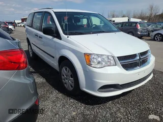 2014 Dodge Grand Caravan American Value with VIN 2C4RDGBGXER413961, listed as a Copart auction lot 54748405 with 146,589 mi miles and Clean Title. Bid and sale history available at DreamBid. Image 1.