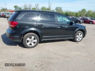 2012 Dodge Journey SXT with VIN 3C4PDDBGXCT160348, listed as a IAAI auction lot 42096075 with 135,095 mi miles and . Bid and sale history available at DreamBid. Image 4.