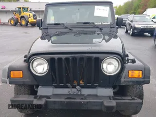 2004 Jeep Wrangler X with VIN 1J4FA39S94P707411, listed as a IAAI auction lot 42187856 with 189,519 mi miles. Bid and sale history available at carsss.com. Image 6.