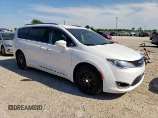2020 Chrysler Pacifica Touring L with VIN 2C4RC1BG7LR125649, listed as a Copart auction lot 57873365 with 117,114 mi miles and Salvage title. Bid and sale history available at DreamBid. Image 4.