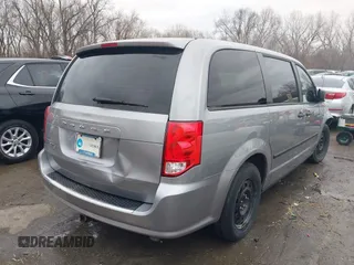 2014 Dodge Grand Caravan American Value with VIN 2C4RDGBG9ER187198, listed as a IAAI auction lot 41669334 with 204,803 mi miles and . Bid and sale history available at DreamBid. Image 4.