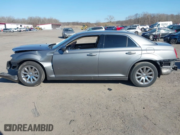 2012 Chrysler 300 with VIN 2C3CCAAG1CH138303, listed as a IAAI auction lot 41773979 with 252,550 mi miles and . Bid and sale history available at DreamBid. Image 14.