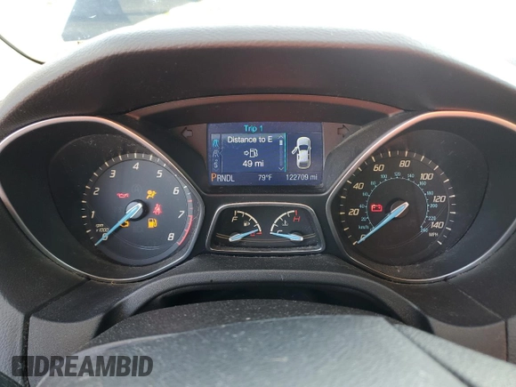 2013 Ford Focus SE z VIN 1FADP3F27DL369634, wystawiony jako Copart lot #61409725 z przebiegiem 122 709 mil mil oraz Szkoda całkowita • Salvage title. Historia ofert i sprzedaży dostępna na DreamBid. Obrazek 9.