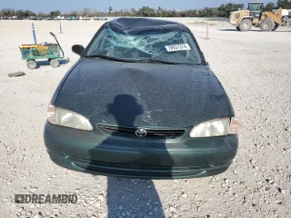 2000 Toyota Corolla VE with VIN 1NXBR12E5YZ387383, listed as a Copart auction lot 78931374 with 162,008 mi miles and Salvage title. Bid and sale history available at DreamBid. Image 5.