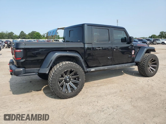 2020 Jeep Gladiator Rubicon with VIN 1C6JJTBG2LL166964, listed as a Copart auction lot 58041945 with 62,716 mi miles and Salvage title. Bid and sale history available at DreamBid. Image 3.