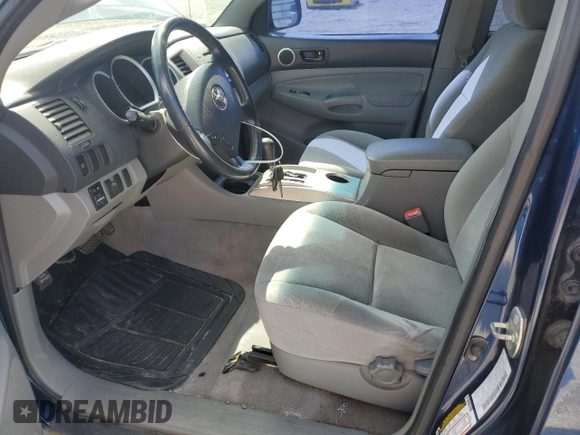 2007 Toyota Tacoma PreRunner with VIN 3TMJU62NX7M038489, listed as a Copart auction lot 53845245 with 263,485 mi miles and Salvage Title. Bid and sale history available at DreamBid. Image 7.