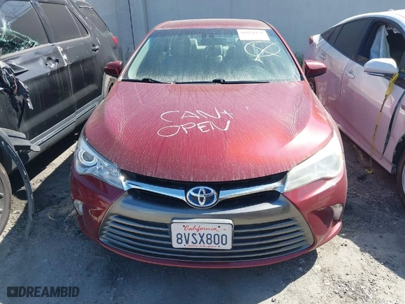 2015 Toyota Camry Hybrid LE with VIN 4T1BD1FK2FU175195, listed as a IAAI auction lot 41824458 with 118,490 mi miles. Bid and sale history available at carsss.com. Image 12.