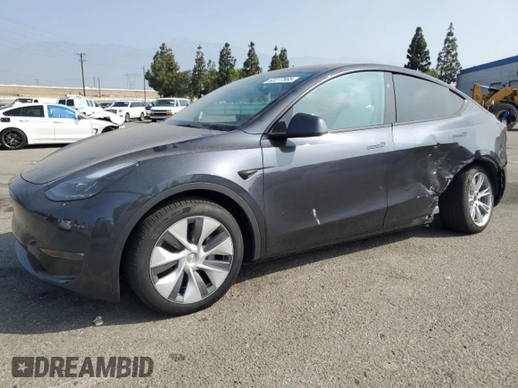 2024 Tesla Model Y Long Range with VIN 7SAYGDEE1RA266653, listed as a Copart auction lot 62277865 with 8,189 mi miles and Salvage title. Bid and sale history available at DreamBid. Image 1.