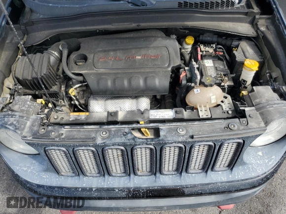2015 Jeep Renegade Trailhawk z VIN ZACCJBCT1FPC41628, wystawiony jako Copart lot #59054825 z przebiegiem 138 053 mil mil oraz Szkoda całkowita • Salvage title. Historia ofert i sprzedaży dostępna na DreamBid. Obrazek 12.