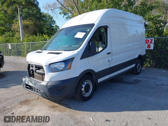 2020 Ford Transit Cargo with VIN 1FTBW1X82LKB49009, listed as a IAAI auction lot 41527513 with 52,802 mi miles and . Bid and sale history available at DreamBid. Image 18.
