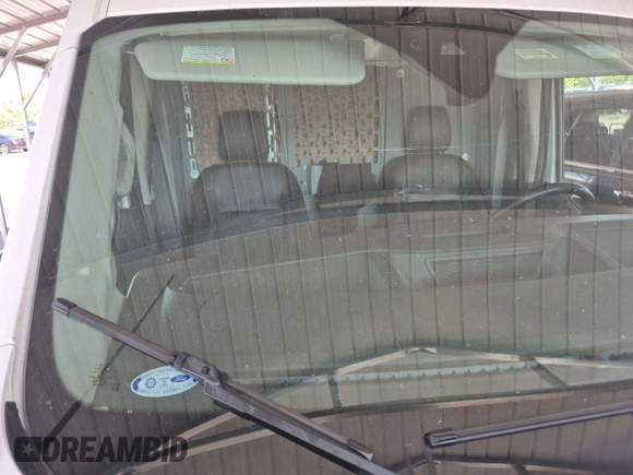 2020 Ford Transit Cargo z VIN 1FTYE1C89LKA17335, wystawiony jako IAAI lot #42561511 z przebiegiem 276 728 mil mil oraz . Historia ofert i sprzedaży dostępna na DreamBid. Obrazek 25.