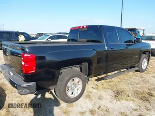 2018 Chevrolet Silverado 1500 LT with VIN 1GCRCREH0JZ348816, listed as a IAAI auction lot 40605540 with Not Provided miles and . Bid and sale history available at DreamBid. Image 4.