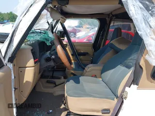 2002 Jeep Wrangler Sahara with VIN 1J4FA59S92P734763, listed as a IAAI auction lot 42411004 with 188,213 mi miles and . Bid and sale history available at DreamBid. Image 5.