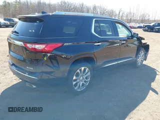 2018 Chevrolet Traverse Premier with VIN 1GNEVJKW8JJ159561, listed as a IAAI auction lot 41774914 with 132,598 mi miles and . Bid and sale history available at DreamBid. Image 4.