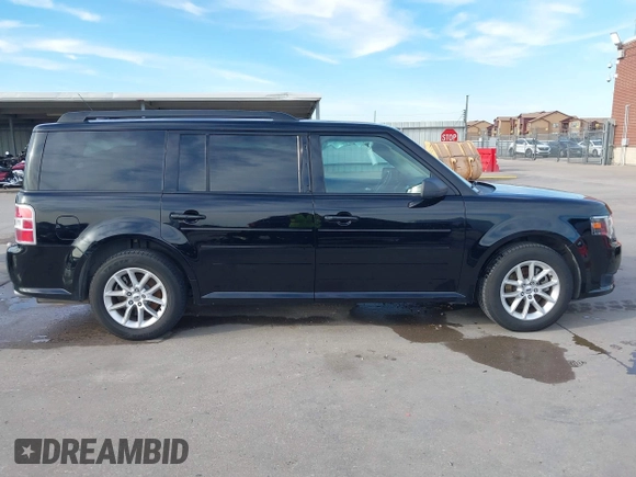 2016 Ford Flex SE with VIN 2FMGK5B88GBA20056, listed as a IAAI auction lot 41308982 with 99,202 mi miles. Bid and sale history available at carsss.com. Image 13.