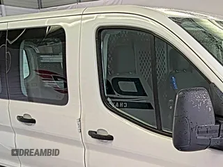 2020 Ford Transit Cargo z VIN 1FTBR1Y89LKA77943, wystawiony jako IAAI lot #42642576 z przebiegiem 144 064 mil mil oraz . Historia ofert i sprzedaży dostępna na DreamBid. Obrazek 12.