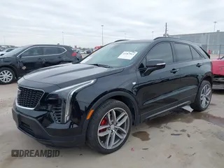 2021 Cadillac XT4 FWD Sport with VIN 1GYFZER40MF039140, listed as a IAAI auction lot 41287513 with 51,725 mi miles and . Bid and sale history available at DreamBid. Image 2.