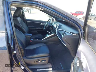 2016 Toyota Mirai with VIN JTDBVRBD6GA000989, listed as a IAAI auction lot 42098383 with 63,686 mi miles and . Bid and sale history available at DreamBid. Image 5.
