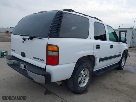 2001 Chevrolet Tahoe LT with VIN 1GNEC13T51R158637, listed as a IAAI auction lot 41718610 with 101,984 mi miles. Bid and sale history available at carsss.com. Image 4.