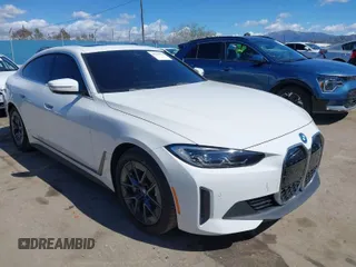 2024 BMW i4 eDrive35 with VIN WBY43AW00RFS68805, listed as a IAAI auction lot 41736170 with 23,101 mi miles. Bid and sale history available at carsss.com. Image 1.