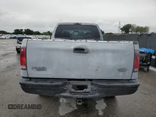 2000 Ford F-250 XL with VIN 1FTNX21F3YED35736, listed as a Copart auction lot 50309805 with 303,811 mi miles and Salvage title. Bid and sale history available at DreamBid. Image 6.