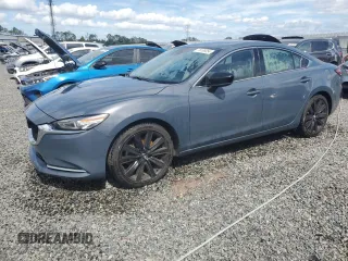2021 Mazda 6 Grand Touring Reserve with VIN JM1GL1WY6M1617833, listed as a Copart auction lot 76189054 with 131,217 mi miles and Non Repairable. Bid and sale history available at DreamBid. Image 1.