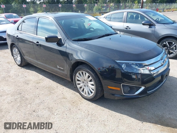 2012 Ford Fusion Hybrid z VIN 3FADP0L31CR380821, wystawiony jako IAAI lot #42332256 z przebiegiem 59 431 mil mil oraz . Historia ofert i sprzedaży dostępna na DreamBid. Obrazek 1.