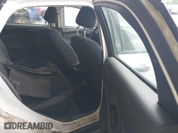 2012 Ford Focus S with VIN 1FAHP3E24CL254409, listed as a IAAI auction lot 42166880 with 123,981 mi miles and . Bid and sale history available at DreamBid. Image 8.