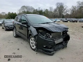 2016 Ford Escape SE with VIN 1FMCU9GX5GUB02417, listed as a Copart auction lot 51762985 with 97,535 mi miles and Salvage Title. Bid and sale history available at DreamBid. Image 11.