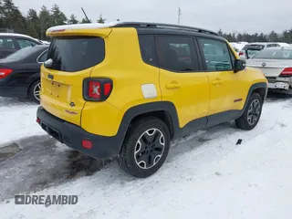 2015 Jeep Renegade Trailhawk with VIN ZACCJBCT9FPB95949, listed as a IAAI auction lot 41558291 with 60,682 mi miles and . Bid and sale history available at DreamBid. Image 4.