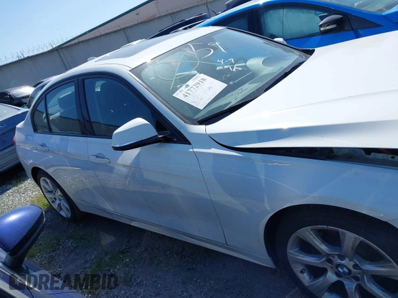 2015 BMW 3 Series 320i with VIN WBA3B1G56FNT06434, listed as a IAAI auction lot 41772918 with 76,782 mi miles. Bid and sale history available at carsss.com. Image 14.