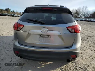 2014 Mazda CX-5 Grand Touring with VIN JM3KE4DY2E0360872, listed as a Copart auction lot 41597495 with 152,412 mi miles and Clean Title. Bid and sale history available at carsss.com. Image 6.