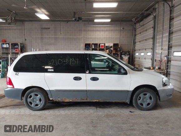 2006 Ford Freestar Cargo with VIN 2FTZA54666BA14556, listed as a IAAI auction lot 42103437 with 147,998 mi miles. Bid and sale history available at carsss.com. Image 13.