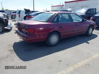 1993 Ford Taurus z VIN 1FACP52U4PG225521, wystawiony jako IAAI lot #42096535 z przebiegiem 76 808 mil mil oraz . Historia ofert i sprzedaży dostępna na DreamBid. Obrazek 4.