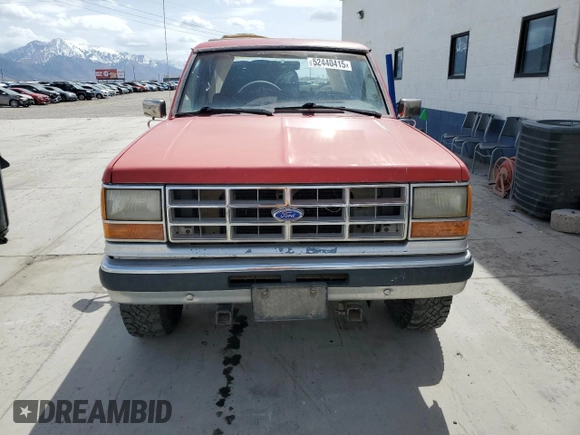 1990 Ford Bronco с VIN 1FMCU14T7LUA56022, выставлен на аукционе Copart как лот 52440415 с пробегом 57 215 миль миль и Чистый • Clean title. История ставок и продаж доступна на DreamBid. Изображение 5.