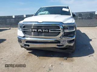 2023 Ram 1500 Laramie with VIN 1C6SRFJT0PN508550, listed as a IAAI auction lot 41913849 with 57,765 mi miles and . Bid and sale history available at DreamBid. Image 6.