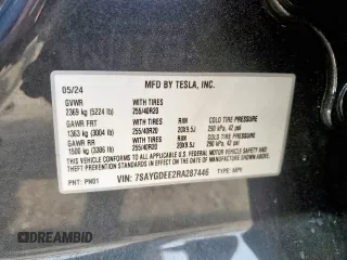 2024 Tesla Model Y Long Range with VIN 7SAYGDEE2RA287446, listed as a Copart auction lot 57640895 with 27,932 mi miles and Salvage title. Bid and sale history available at DreamBid. Image 13.