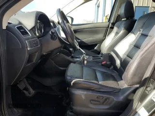 2016 Mazda CX-5 Grand Touring with VIN JM3KE4DY0G0679190, listed as a Copart auction lot 53619495 with 154,649 mi miles and Salvage Title. Bid and sale history available at carsss.com. Image 7.