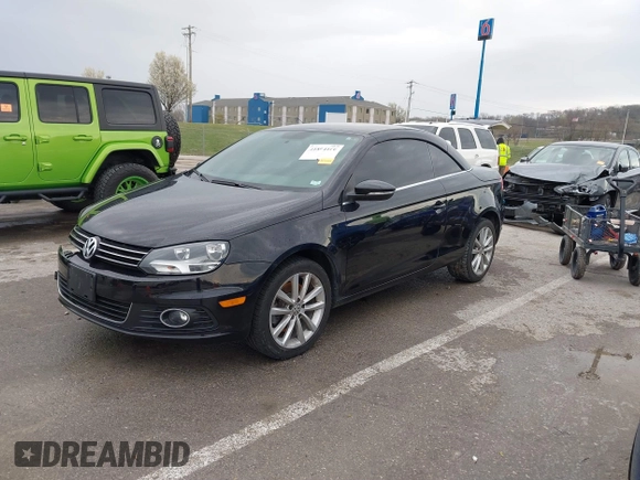 2014 Volkswagen Eos Komfort with VIN WVWBW8AH4EV007229, listed as a IAAI auction lot 41894160 with 66,984 mi miles and . Bid and sale history available at DreamBid. Image 17.