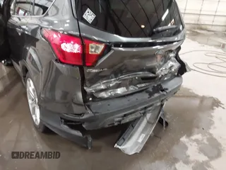 2019 Ford Escape Titanium with VIN 1FMCU9J91KUB11957, listed as a IAAI auction lot 41928264 with 72,460 mi miles. Bid and sale history available at carsss.com. Image 18.