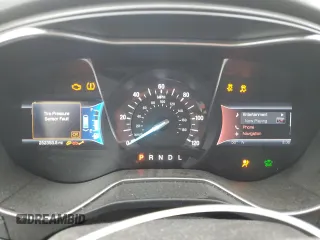 2014 Ford Fusion Titanium Hybrid z VIN 3FA6P0RU1ER118499, wystawiony jako Copart lot #58591305 z przebiegiem 252 353 mil mil oraz Szkody całkowita. Historia ofert i sprzedaży dostępna na DreamBid. Obrazek 9.