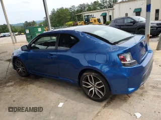 2014 Scion tC z VIN JTKJF5C76E3087992, wystawiony jako Copart lot #56058445 z przebiegiem 84 387 mil mil oraz Czysty tytuł • Clean title. Historia ofert i sprzedaży dostępna na DreamBid. Obrazek 2.