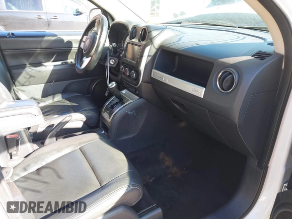 2015 Jeep Compass High Altitude Edition with VIN 1C4NJCEAXFD198397, listed as a IAAI auction lot 41816495 with 143,023 mi miles. Bid and sale history available at carsss.com. Image 5.