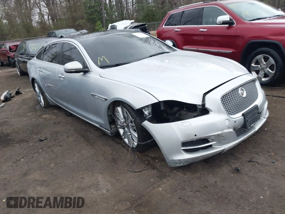 2015 Jaguar XJ with VIN SAJWA2GZ8F8V83551, listed as a IAAI auction lot 41909403 with 112,098 mi miles. Bid and sale history available at carsss.com. Image 1.