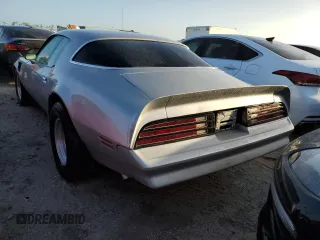 1977 Pontiac Firebird z VIN 2W87Z7N152633, wystawiony jako Copart lot #41438935 z przebiegiem 17 837 mil mil oraz Nie do naprawy. Historia ofert i sprzedaży dostępna na DreamBid. Obrazek 6.