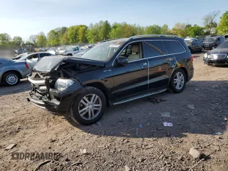2013 Mercedes-Benz GL 450 z VIN 4JGDF7CE7DA206086, wystawiony jako Copart lot #54831465 z przebiegiem Nie podano mil oraz Szkody całkowita. Historia ofert i sprzedaży dostępna na DreamBid. Obrazek 1.