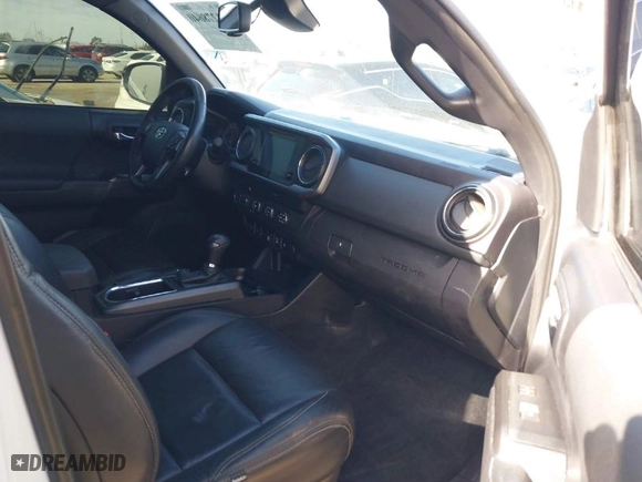 2019 Toyota Tacoma 4WD SR with VIN 3TMCZ5AN3KM277204, listed as a IAAI auction lot 41278640 with 78,930 mi miles. Bid and sale history available at carsss.com. Image 5.