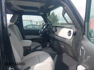 2023 Jeep Gladiator High Altitude z VIN 1C6HJTFG0PL504618, wystawiony jako IAAI lot #41877983 z przebiegiem 26 402 mil mil oraz . Historia ofert i sprzedaży dostępna na DreamBid. Obrazek 5.