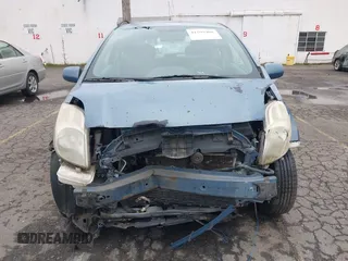 2007 Toyota Yaris z VIN JTDJT903375113576, wystawiony jako IAAI lot #41599408 z przebiegiem 192 543 mil mil oraz . Historia ofert i sprzedaży dostępna na DreamBid. Obrazek 13.