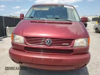 1999 Volkswagen EuroVan с VIN WV2MH2703XH045037, выставлен на аукционе Copart как лот 57109265 с пробегом 265 855 миль миль и Списание • Salvage title. История ставок и продаж доступна на DreamBid. Изображение 5.